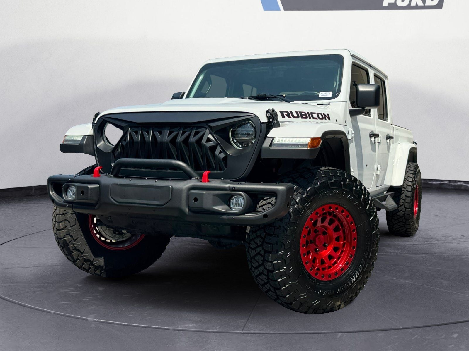 2022 Jeep Gladiator Rubicon in Bright White Clearcoat — front three-quarter view