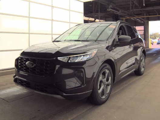 2023 Ford Escape ST-Line in Cinnabar Red — front three-quarter view