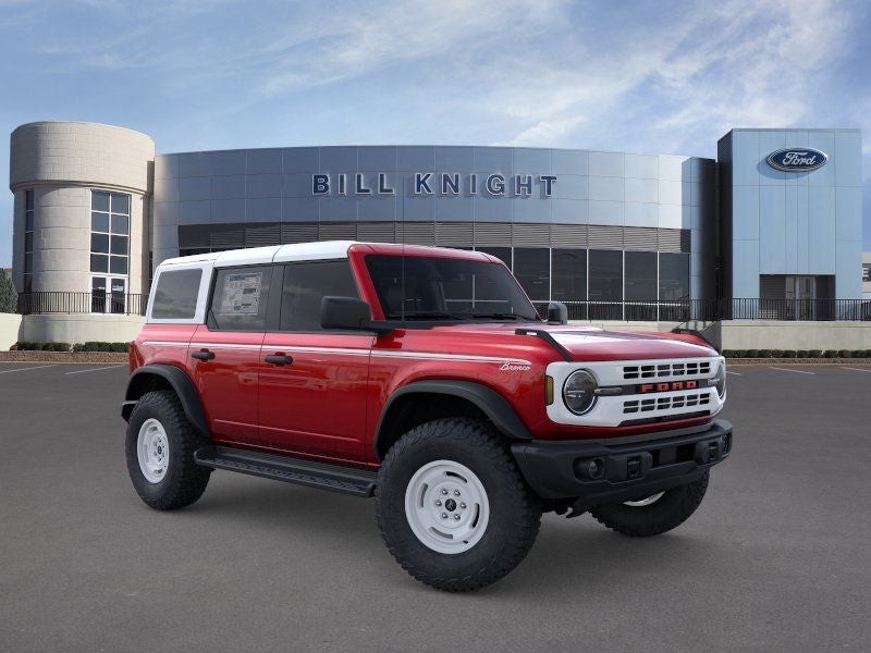 2026 Ford Bronco Heritage Edition in Ruby Red Metallic Tinted Clearcoat — front three-quarter view