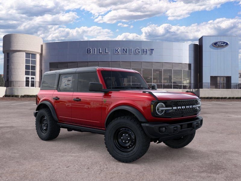 2026 Ford Bronco Badlands in Ruby Red Metallic Tinted Clearcoat — front three-quarter view
