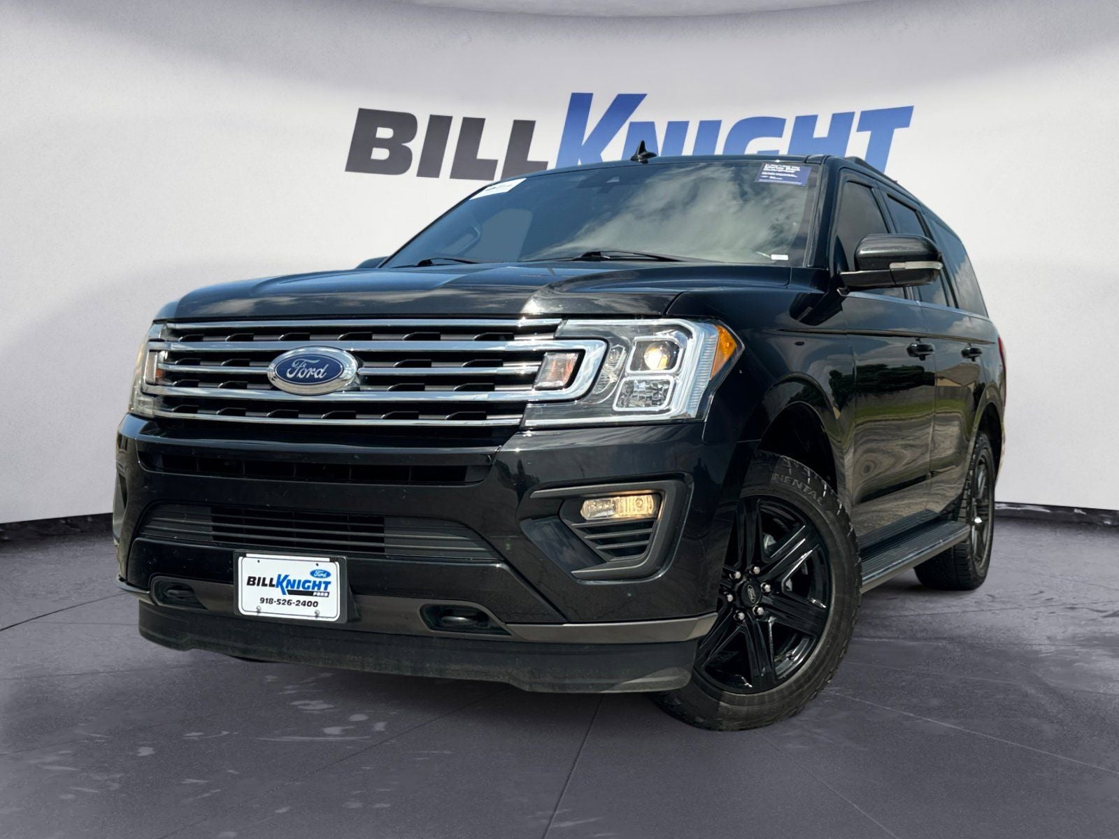 2021 Ford Expedition XLT in Black Metallic — front three-quarter view