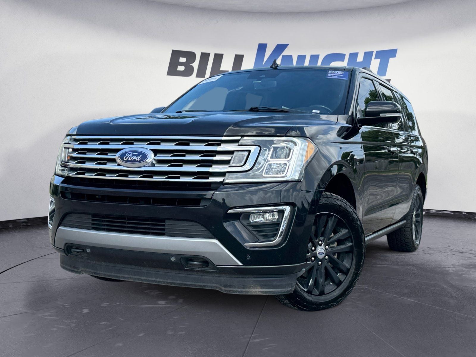 2019 Ford Expedition Limited in Black Metallic — front three-quarter view