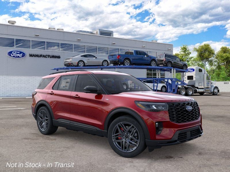2026 Ford Explorer ST-Line in Rapid Red Metallic Tinted Clearcoat — front three-quarter view