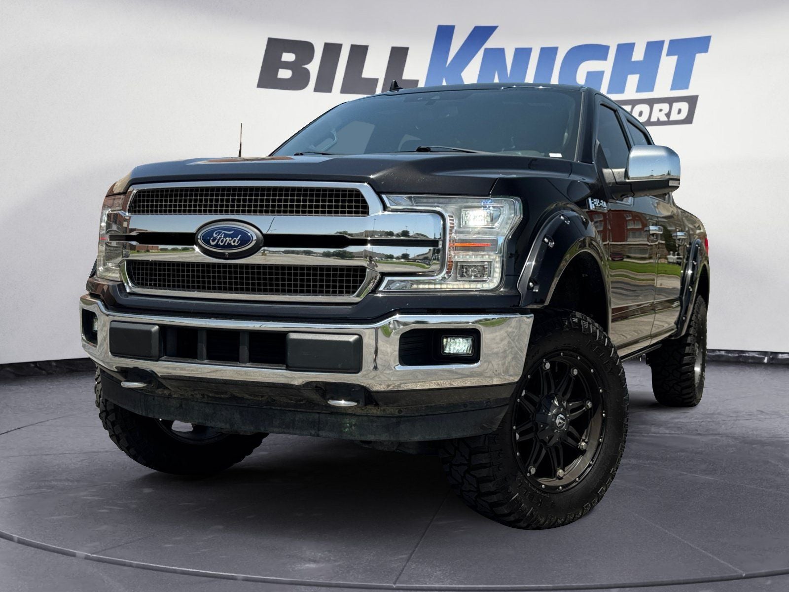 2019 Ford F-150 King Ranch in Agate Black Metallic — front three-quarter view