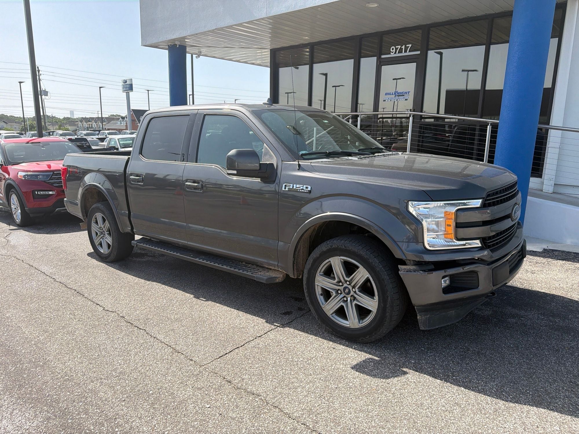 2018 Ford F-150 Lariat in Magnetic Metallic — front three-quarter view
