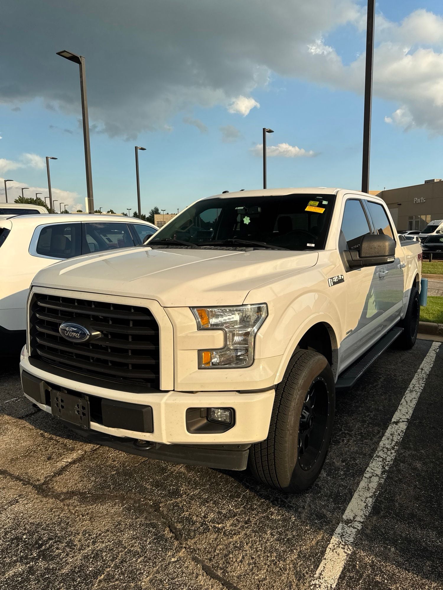 2017 Ford F-150 XLT in Oxford White — front three-quarter view