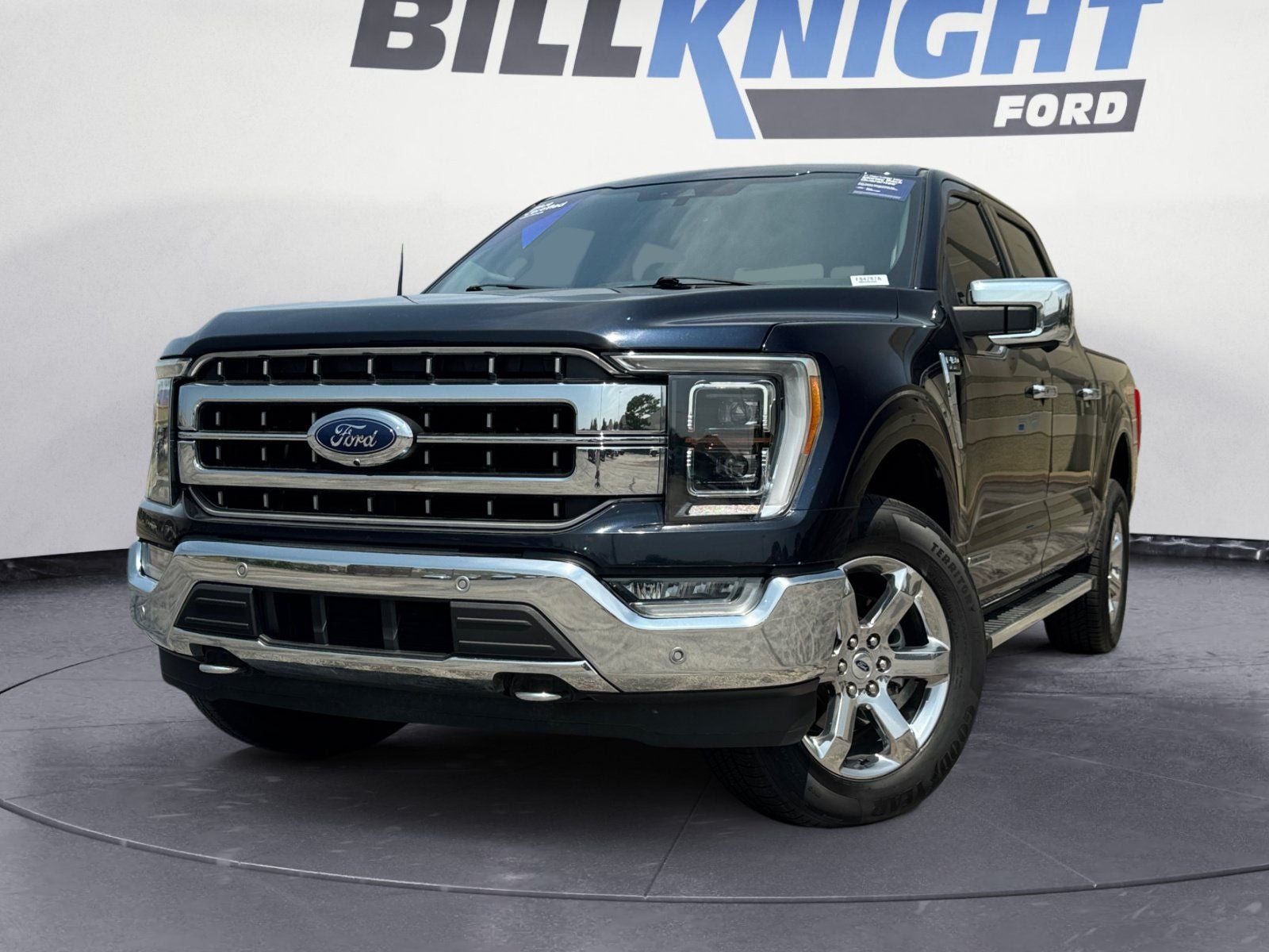 2022 Ford F-150 Lariat in Blue Metallic — front three-quarter view