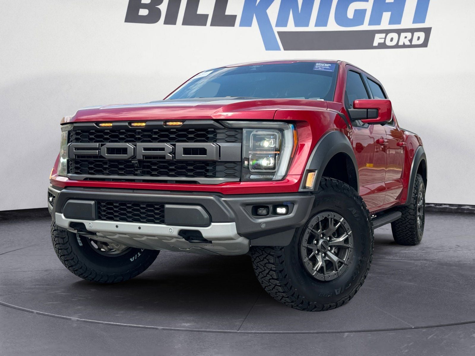 2022 Ford F-150 Raptor in Red Metallic — front three-quarter view